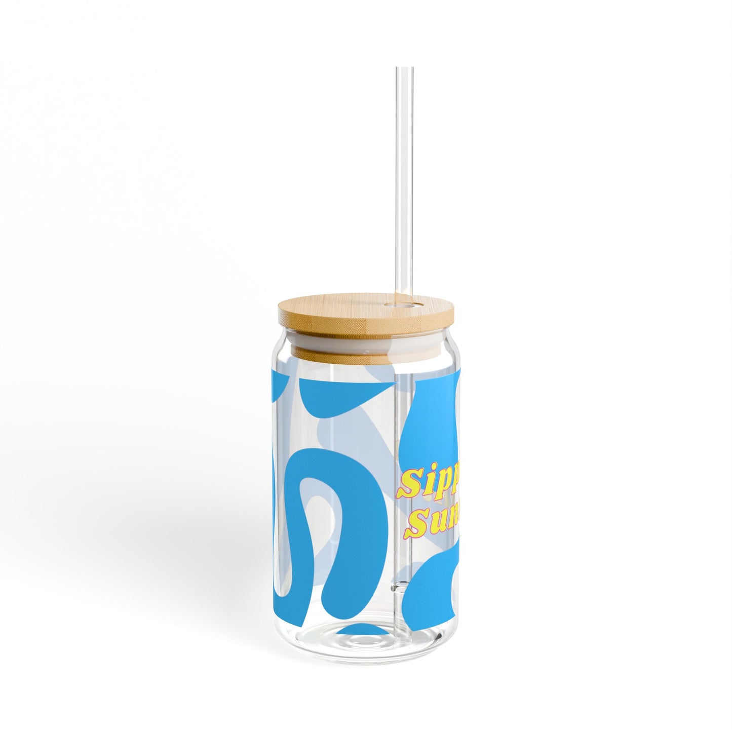 Clear tumbler with blue abstract design, wooden lid, and straw