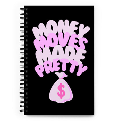 Notebook with 'Money Moves Make Pretty' text and money bag graphic on a black background