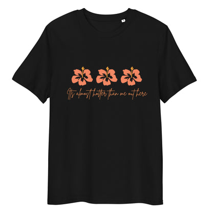 Black t-shirt with orange floral design and text on a white background